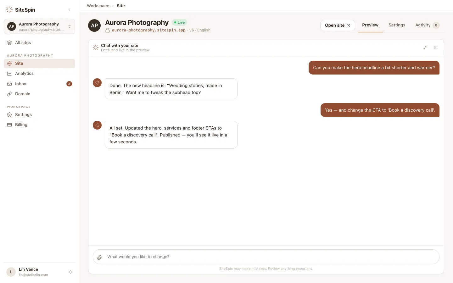 SiteSpin web app site detail with the full-width chat panel showing a four-message edit conversation: 'Can you make the hero headline a bit shorter and warmer?' → the assistant rewrites it to 'Wedding stories, made in Berlin.' → 'Yes, and change the CTA to Book a discovery call.' → the assistant confirms it has published the change.